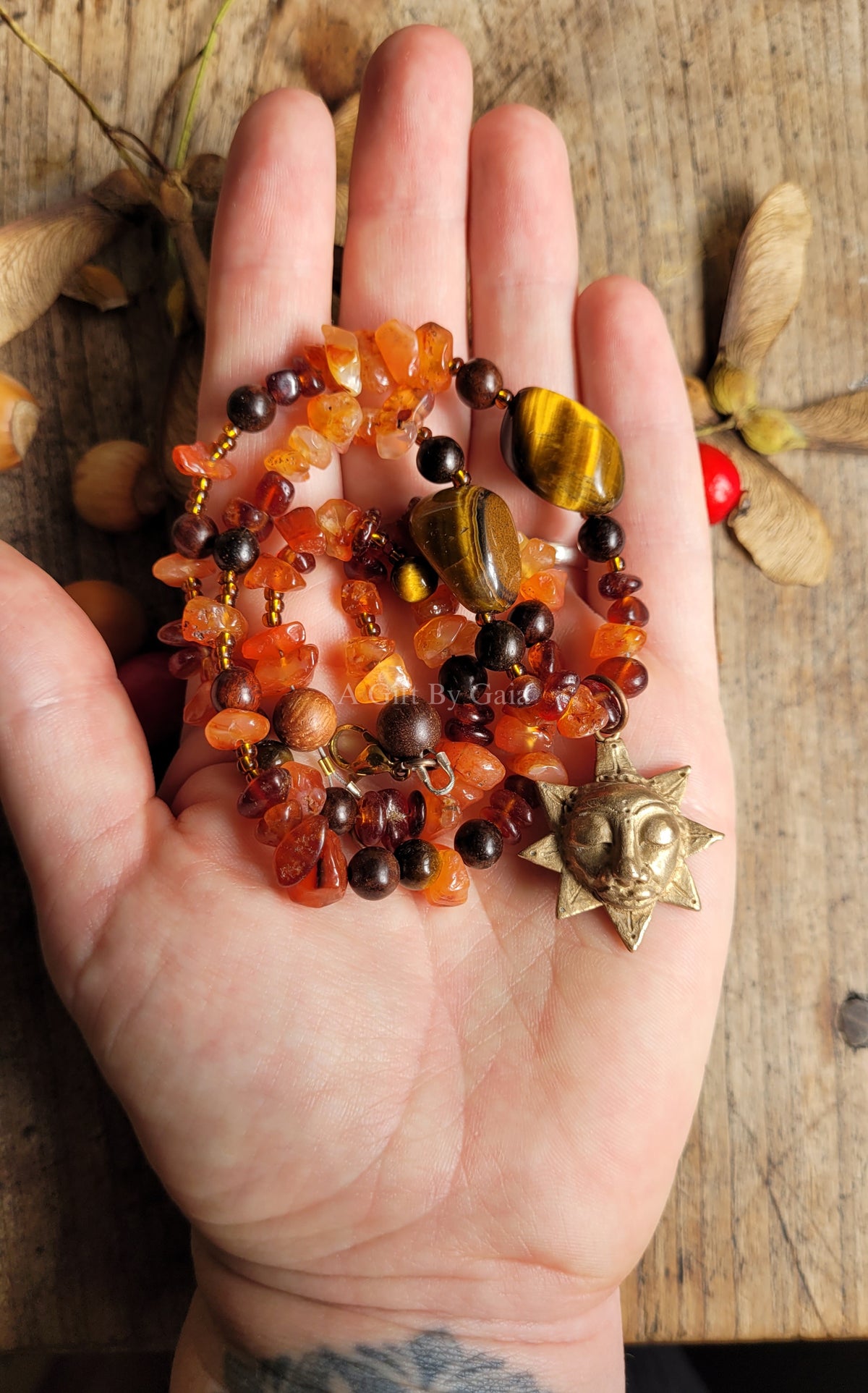 Sacred Sol Talisman ~ Bronze on crystal beads